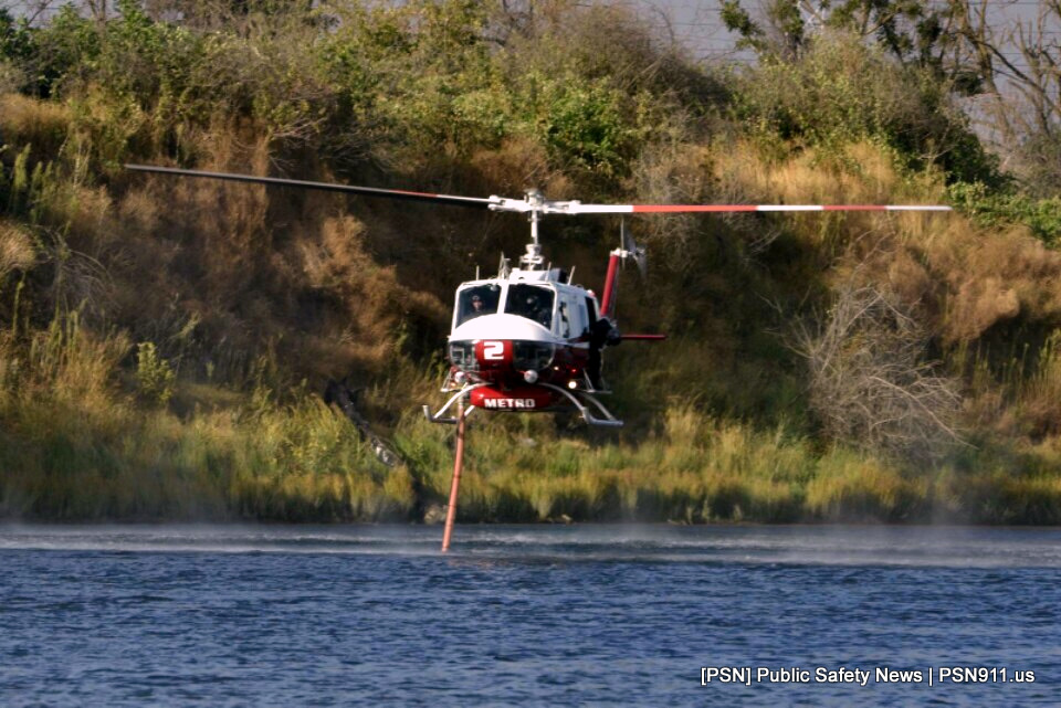 Grass fire burns along American River Parkway